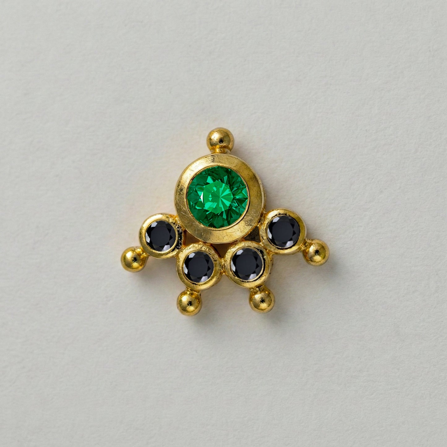 MOOKUTHI GREEN STONE GOLD PLATED NOSEPIN